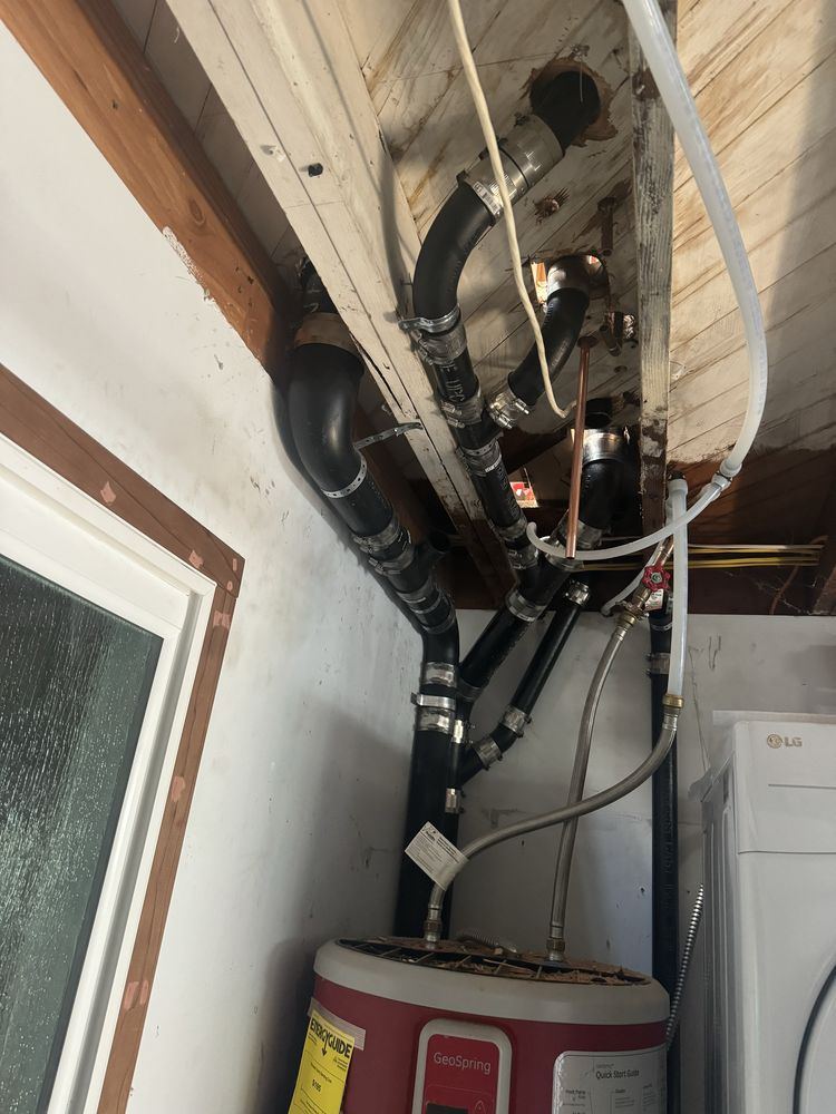 Water heater installation in a utility closet